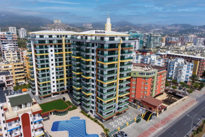 Buy a seafront 1-bedroom apartment in Mahmutlar, Alanya — 60 m²