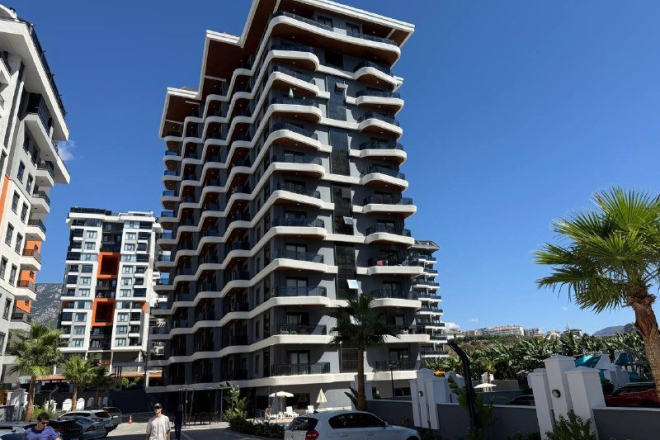 Buy a 1-bedroom apartment in Mahmutlar, Alanya — 50 m² with pools