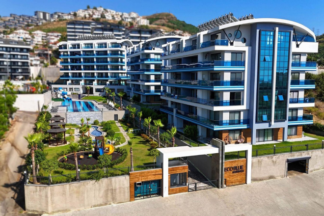Sea views and flowering greenery — a one-bedroom home in Kargicak